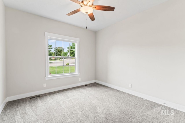 12462 S Sunrise Mist Loop, Nampa, ID 83686 - unfurnished room with carpet floors and a ceiling fan