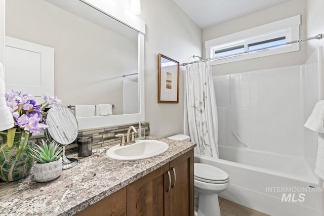 12462 S Sunrise Mist Loop, Nampa, ID 83686 - bathroom with vanity, shower / bath combination with curtain, tile patterned flooring, and tasteful backsplash