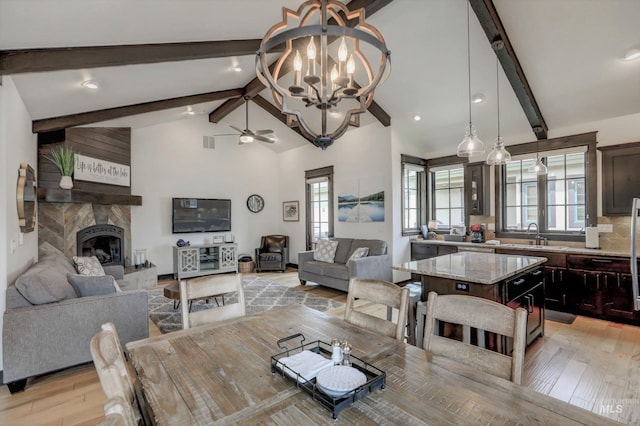 1520 Roosevelt Ave, Mccall, ID 83638 - dining area with light wood-style flooring, a chandelier, plenty of natural light, ceiling fan, and recessed lighting