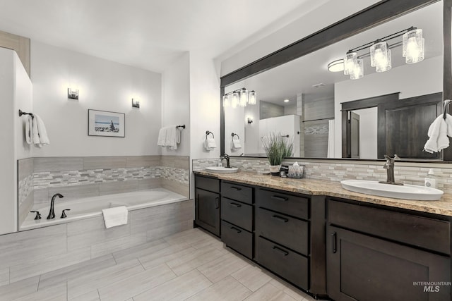 1520 Roosevelt Ave, Mccall, ID 83638 - bathroom with double vanity, a bath, decorative backsplash, and a tile shower