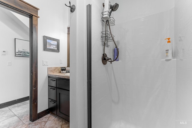 1520 Roosevelt Ave, Mccall, ID 83638 - full bath featuring vanity, a stall shower, and baseboards