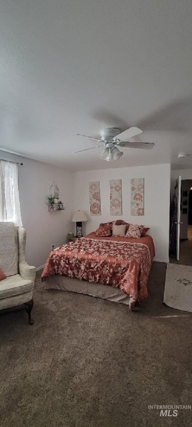 bedroom featuring carpet and ceiling fan