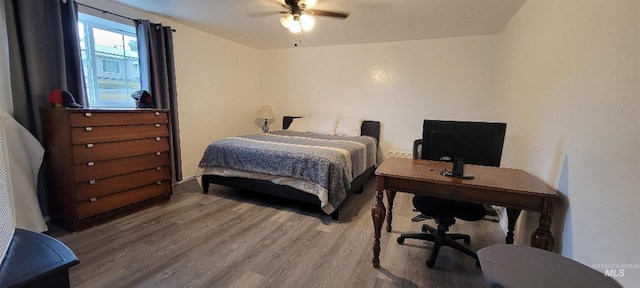 bedroom featuring ceiling fan and hardwood / wood-style floors