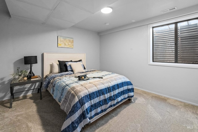 bedroom featuring carpet flooring, baseboards, and visible vents