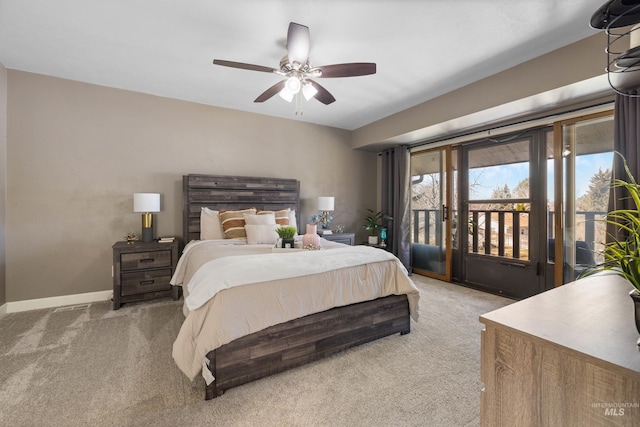 carpeted bedroom featuring access to outside, baseboards, and ceiling fan