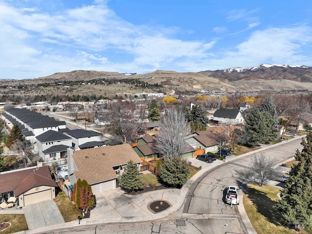 drone / aerial view with a mountain view and a residential view