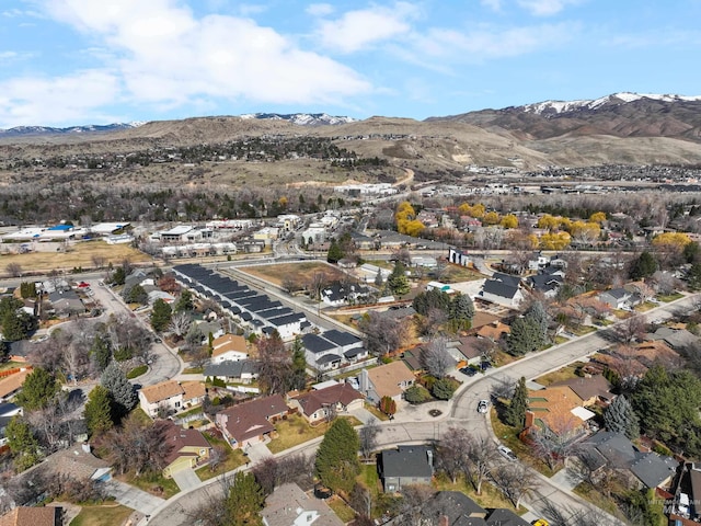 aerial view featuring a mountain view and a residential view