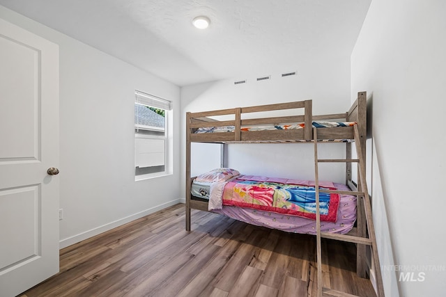 11002 W Hidden Point St, Star, ID 83669 - bedroom with wood finished floors and baseboards