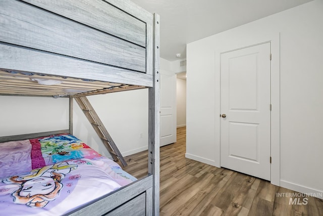 11002 W Hidden Point St, Star, ID 83669 - bedroom featuring light wood-style flooring and baseboards