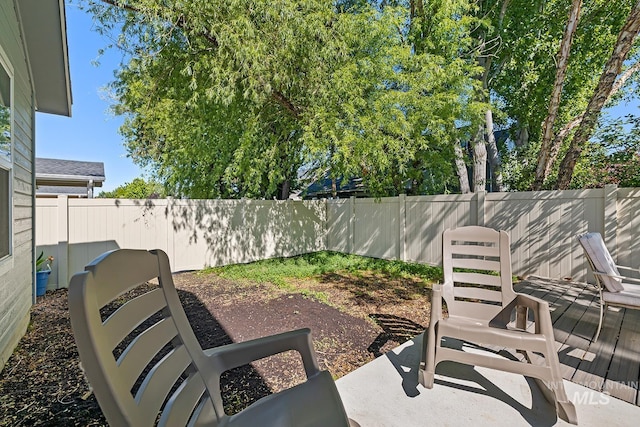 11002 W Hidden Point St, Star, ID 83669 - fenced backyard with a wooden deck