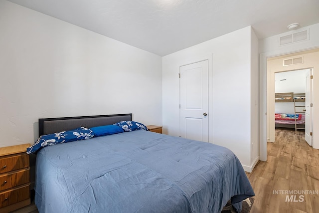 11002 W Hidden Point St, Star, ID 83669 - bedroom featuring light wood finished floors and baseboards