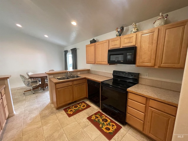 kitchen featuring black appliances, kitchen peninsula, sink, and light tile patterned floors