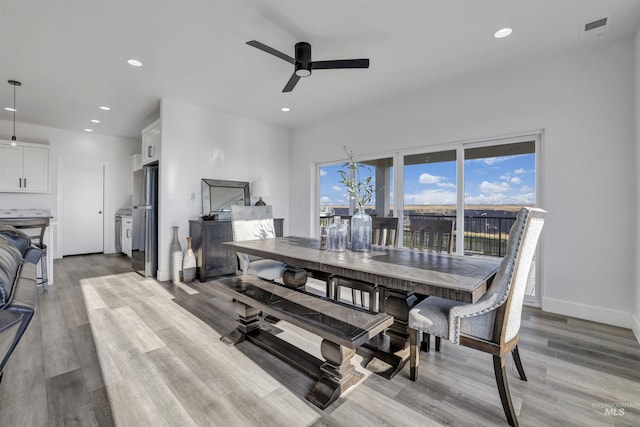 dining area featuring a ceiling fan, light wood-style flooring, recessed lighting, and baseboards