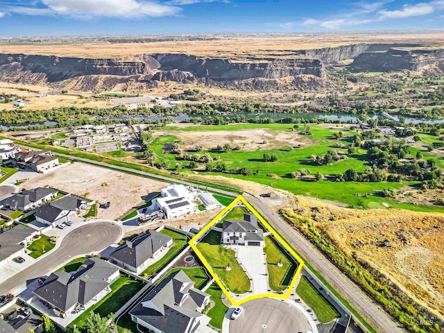 bird's eye view featuring a water and mountain view