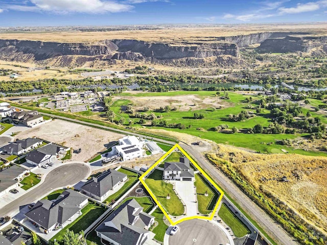 aerial view with a residential view and a water view