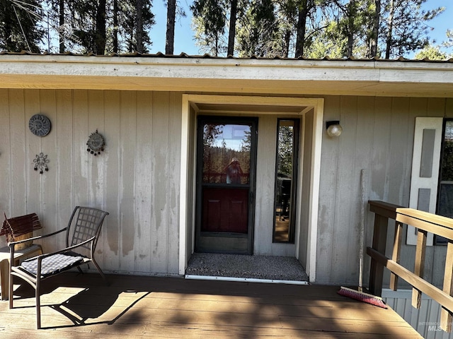 doorway to property featuring a deck