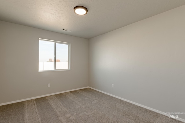 2853 N Eagle Meadow Ave, Kuna, ID 83634 - carpeted spare room featuring a textured ceiling