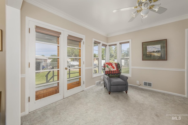 2371 SW 2nd Ave, Ontario, OR 97914 - living area with ornamental molding, carpet flooring, baseboards, french doors, and ceiling fan