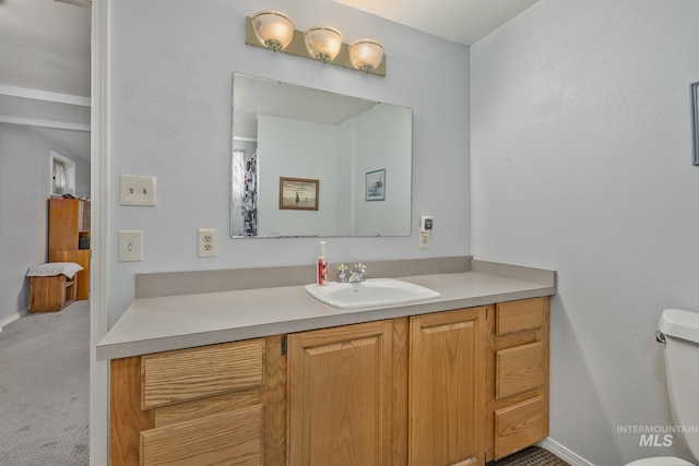 2371 SW 2nd Ave, Ontario, OR 97914 - full bath with vanity, toilet, and baseboards