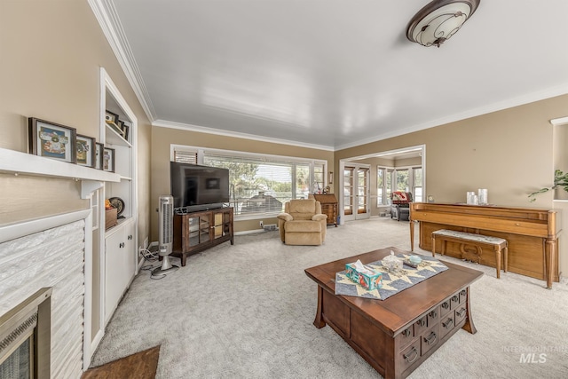 2371 SW 2nd Ave, Ontario, OR 97914 - living room with light colored carpet, crown molding, a stone fireplace, and french doors