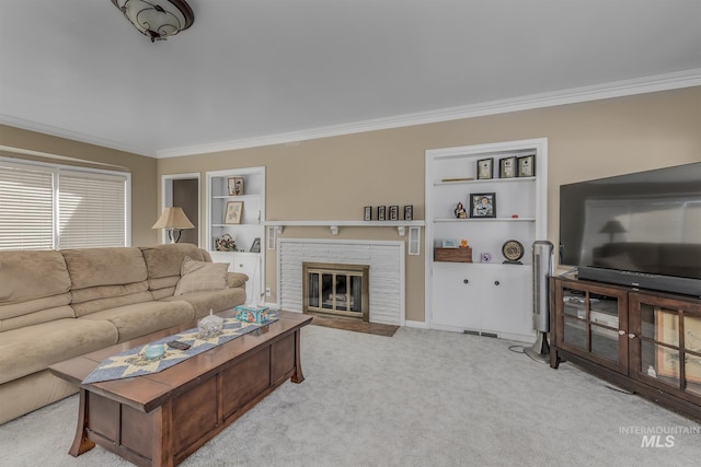 2371 SW 2nd Ave, Ontario, OR 97914 - living area with crown molding, built in shelves, carpet, and a fireplace
