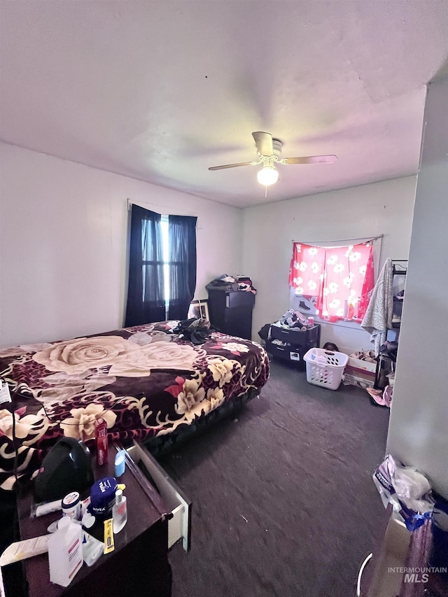 carpeted bedroom featuring a ceiling fan