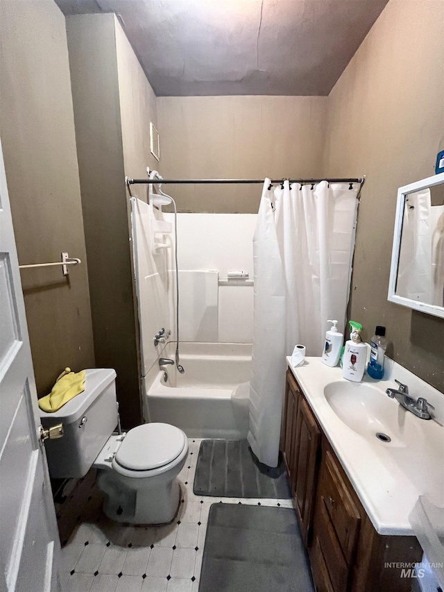 bathroom with shower / bath combo, vanity, toilet, and visible vents