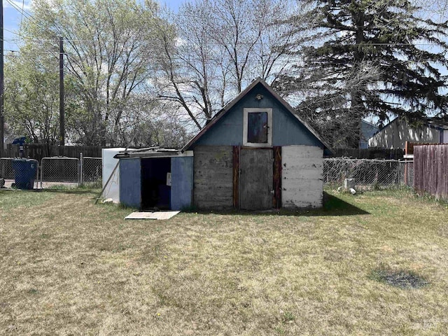 view of shed featuring a fenced backyard