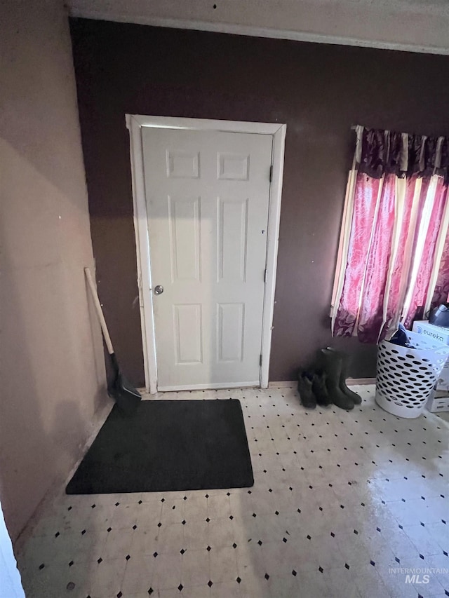 entryway with tile patterned floors
