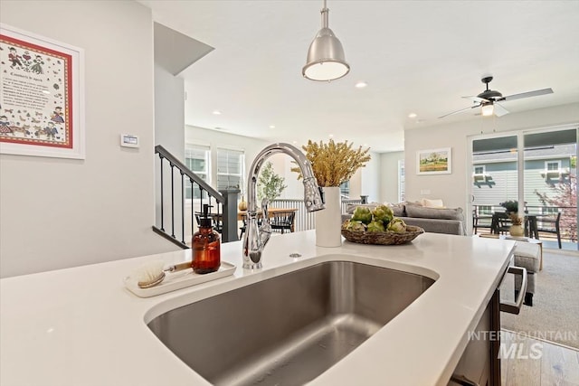 4153 E Raincloud Ln, Boise, ID 83716 - kitchen view of light countertops, a ceiling fan, decorative light fixtures, and recessed lighting