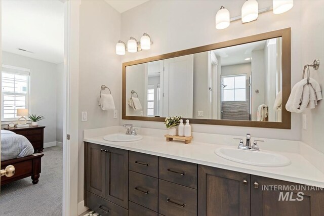 4153 E Raincloud Ln, Boise, ID 83716 - bathroom with double vanity, plenty of natural light, and ensuite bath