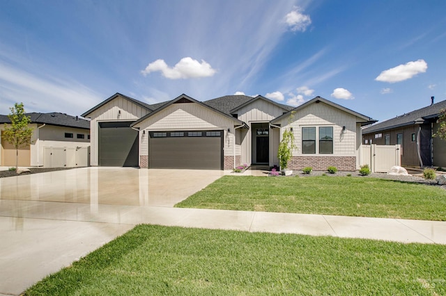 3496 W Parodin St, Eagle, ID 83616 - view of front facade featuring a garage, driveway, brick siding, and board and batten siding