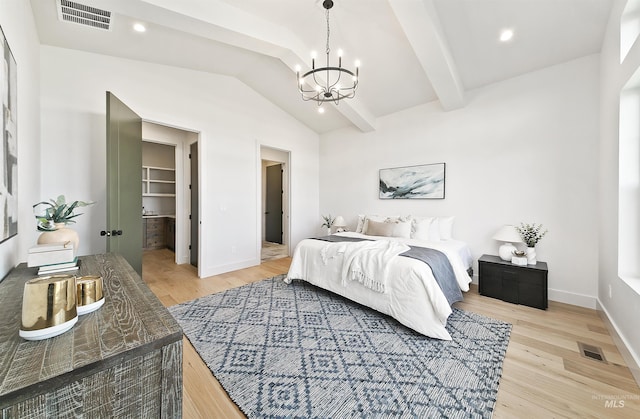 3496 W Parodin St, Eagle, ID 83616 - bedroom featuring a chandelier, lofted ceiling, light wood-style floors, a walk in closet, and baseboards