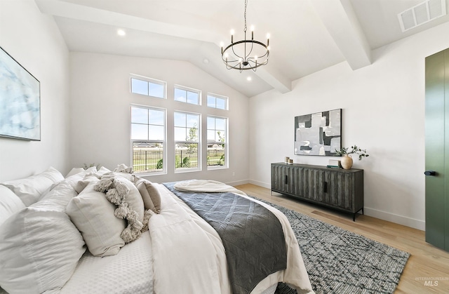 3496 W Parodin St, Eagle, ID 83616 - bedroom featuring a chandelier, light wood-style floors, baseboards, and recessed lighting