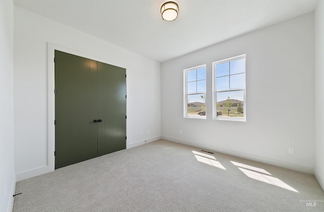 3496 W Parodin St, Eagle, ID 83616 - unfurnished bedroom with carpet flooring, a closet, and baseboards