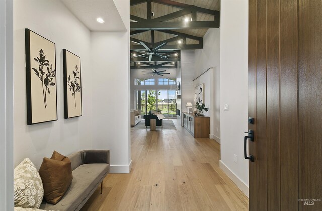 3496 W Parodin St, Eagle, ID 83616 - foyer featuring light wood-style floors, baseboards, a ceiling fan, and a towering ceiling