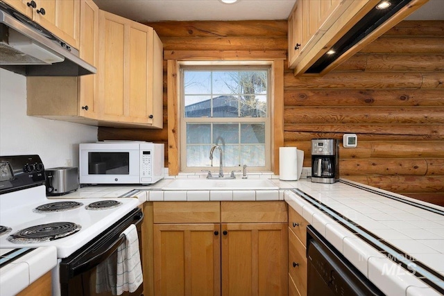 kitchen featuring sink, dishwasher, range with electric stovetop, tile counters, and light brown cabinetry