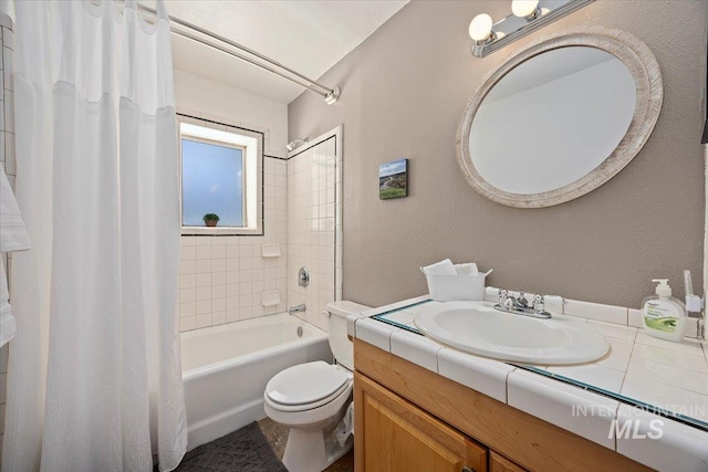 full bathroom with vanity, toilet, and shower / bathtub combination with curtain