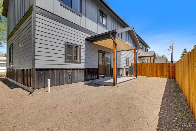 back of house featuring a patio area