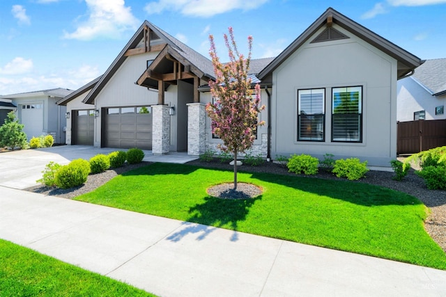 view of front of property with a garage, concrete driveway, and stucco siding