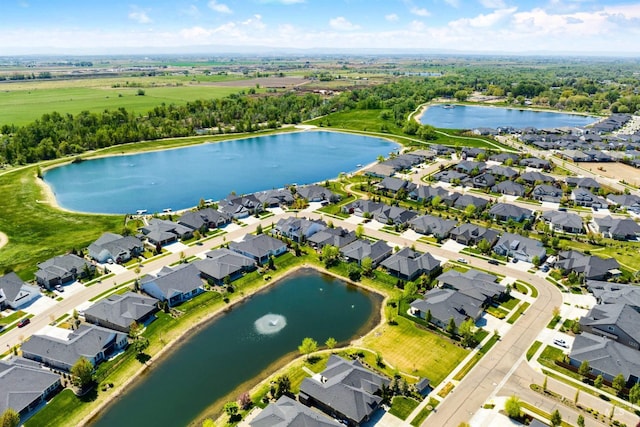 aerial perspective of suburban area featuring a large body of water