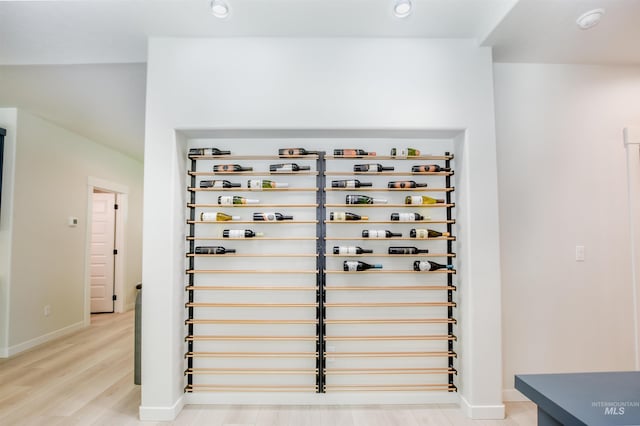 wine cellar featuring light hardwood / wood-style flooring