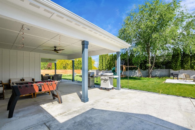 view of patio featuring ceiling fan