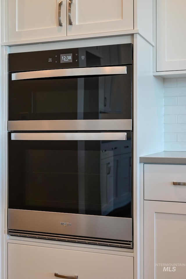2372 N Leatherwood Ave, Star, ID 83669 - kitchen view of double wall oven and white cabinetry