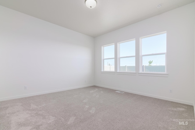 2372 N Leatherwood Ave, Star, ID 83669 - empty room featuring light carpet and baseboards