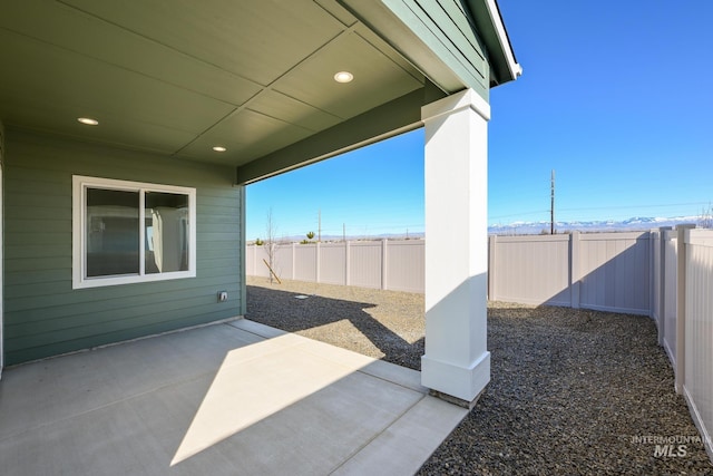 2372 N Leatherwood Ave, Star, ID 83669 - fenced backyard with a patio area
