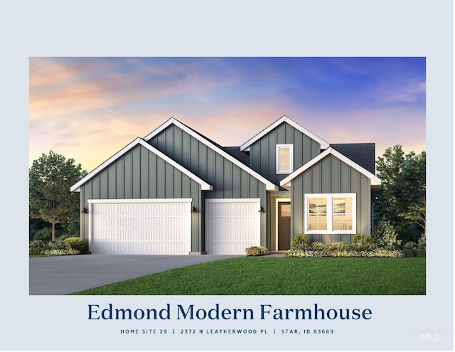 2372 N Leatherwood Ave, Star, ID 83669 - view of front of home featuring board and batten siding, a garage, driveway, and a front lawn