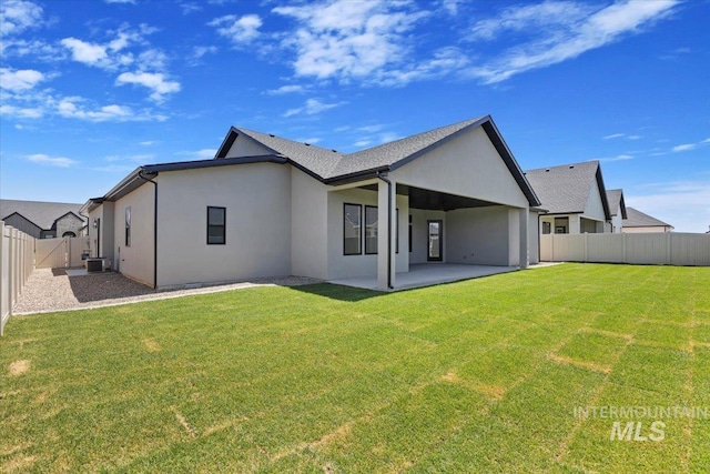 1967 Red Rock Way, Twin Falls, ID 83301 - rear view of property with a patio, stucco siding, and a fenced backyard