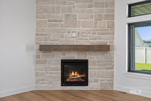 1967 Red Rock Way, Twin Falls, ID 83301 - detailed view of a large fireplace and wood finished floors