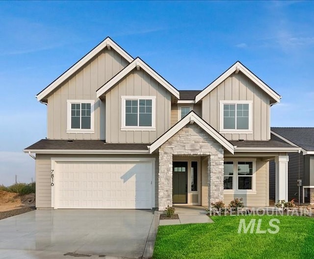 7625 W Whisper Ridge Dr, Meridian, ID 83646 - craftsman-style house featuring an attached garage, driveway, board and batten siding, a front lawn, and stone siding